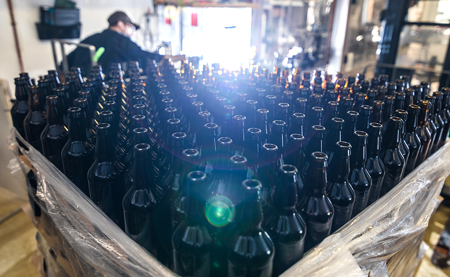 stack-of-empty-beer-bottles-P5UFAMF